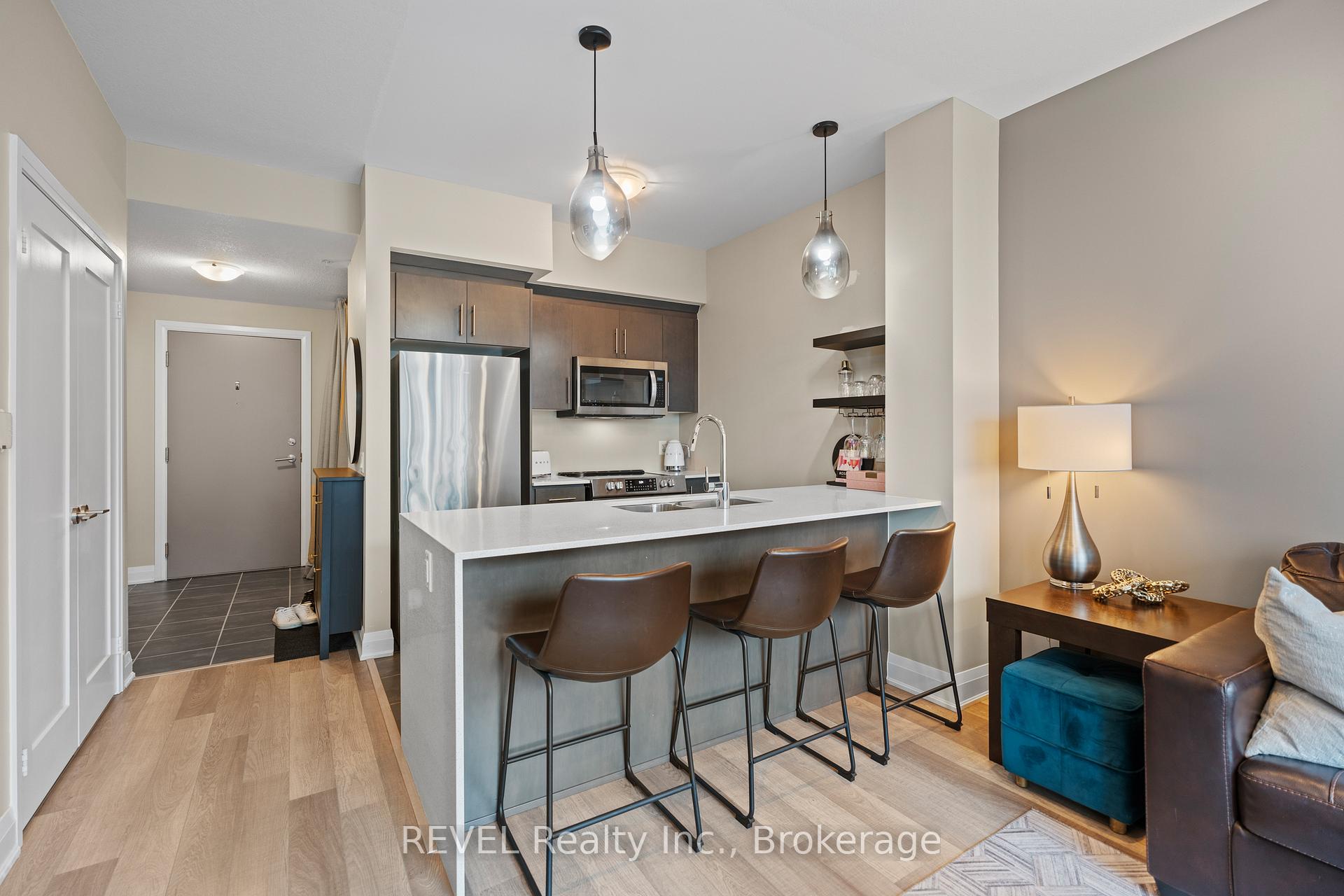 Photo 5 of Unit 410, 16 Concord Place, Grimsby, Grimsby Beach — HOMEH