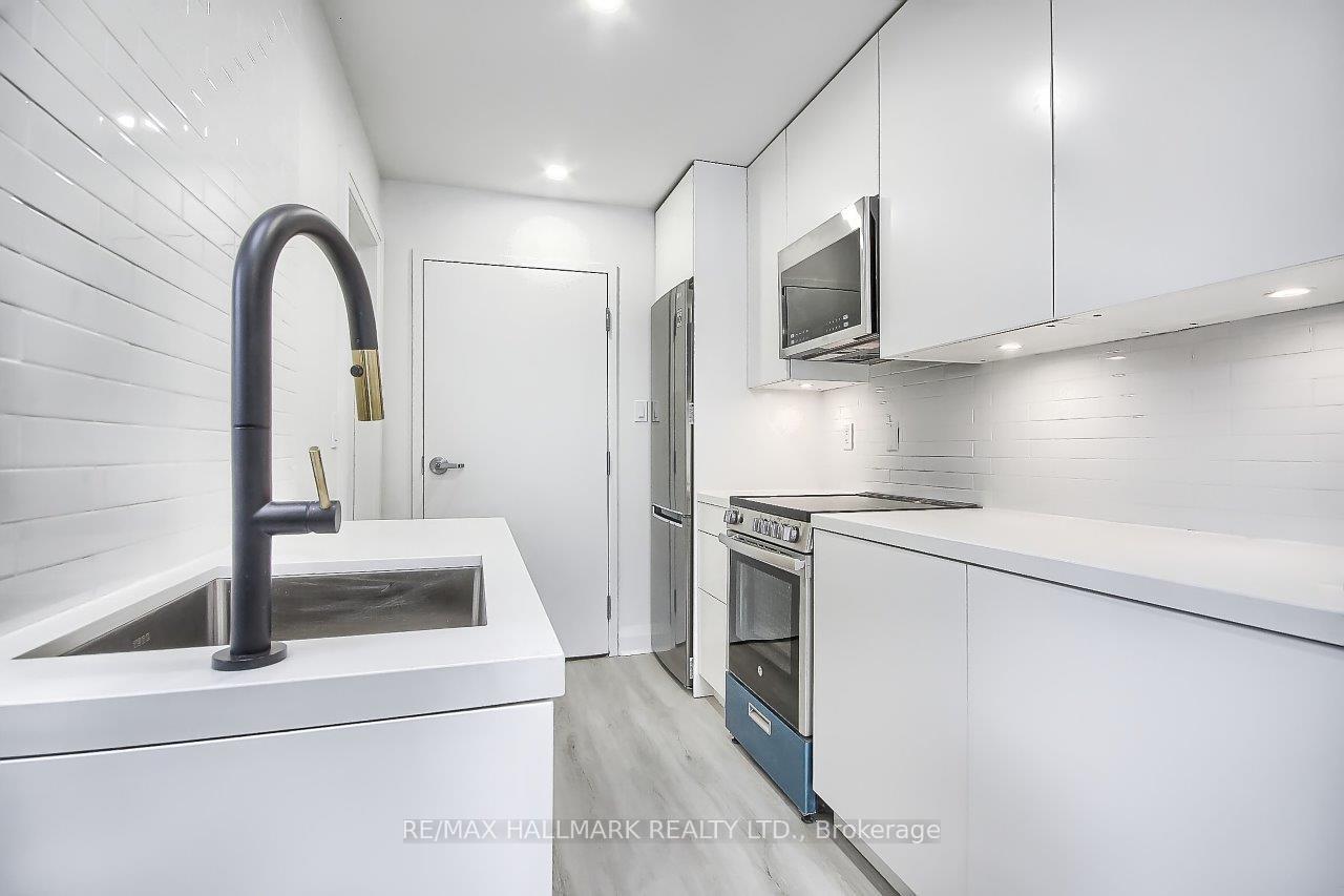 Photo 3 of Unit 2, 415 Dundas Street E, Toronto, Moss Park — HOMEH