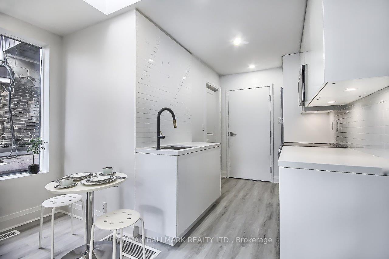 Photo 4 of Unit 2, 415 Dundas Street E, Toronto, Moss Park — HOMEH
