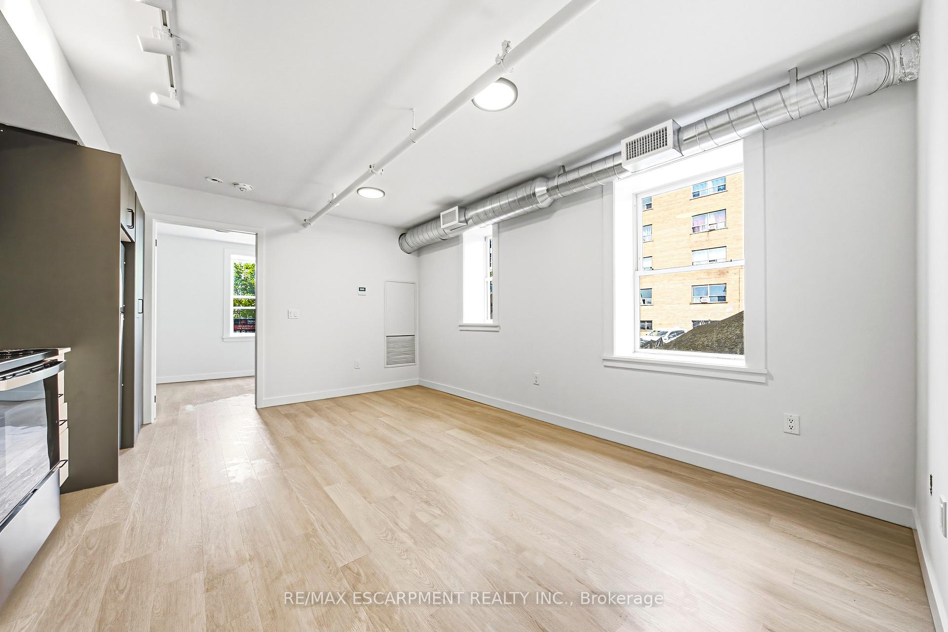 Photo 2 of Unit 103, 325 James Street S, Hamilton, Corktown — HOMEH
