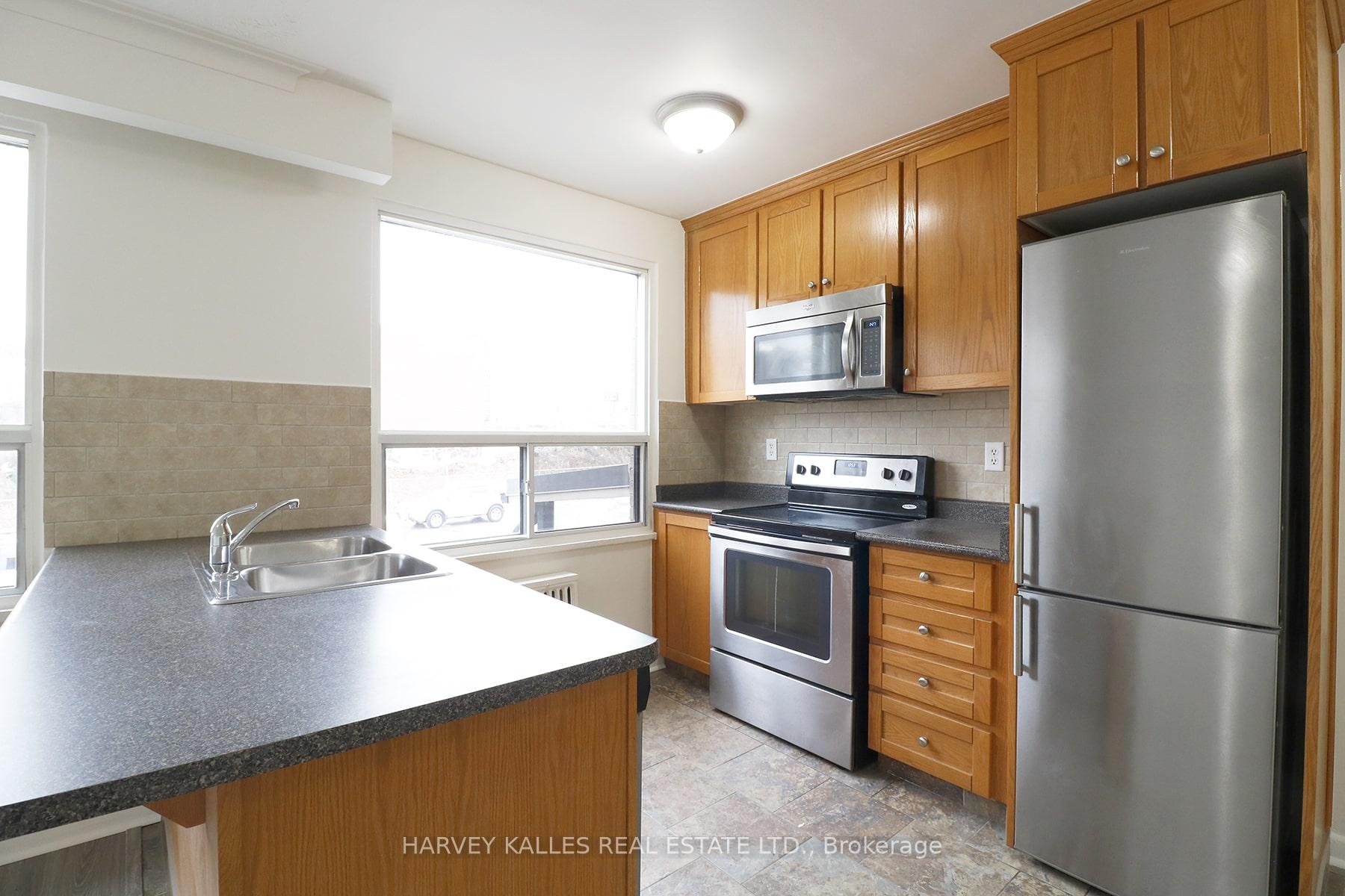 Photo 5 of Unit 102, 500 Gilbert Avenue, Toronto, Caledonia-Fairbank — HOMEH
