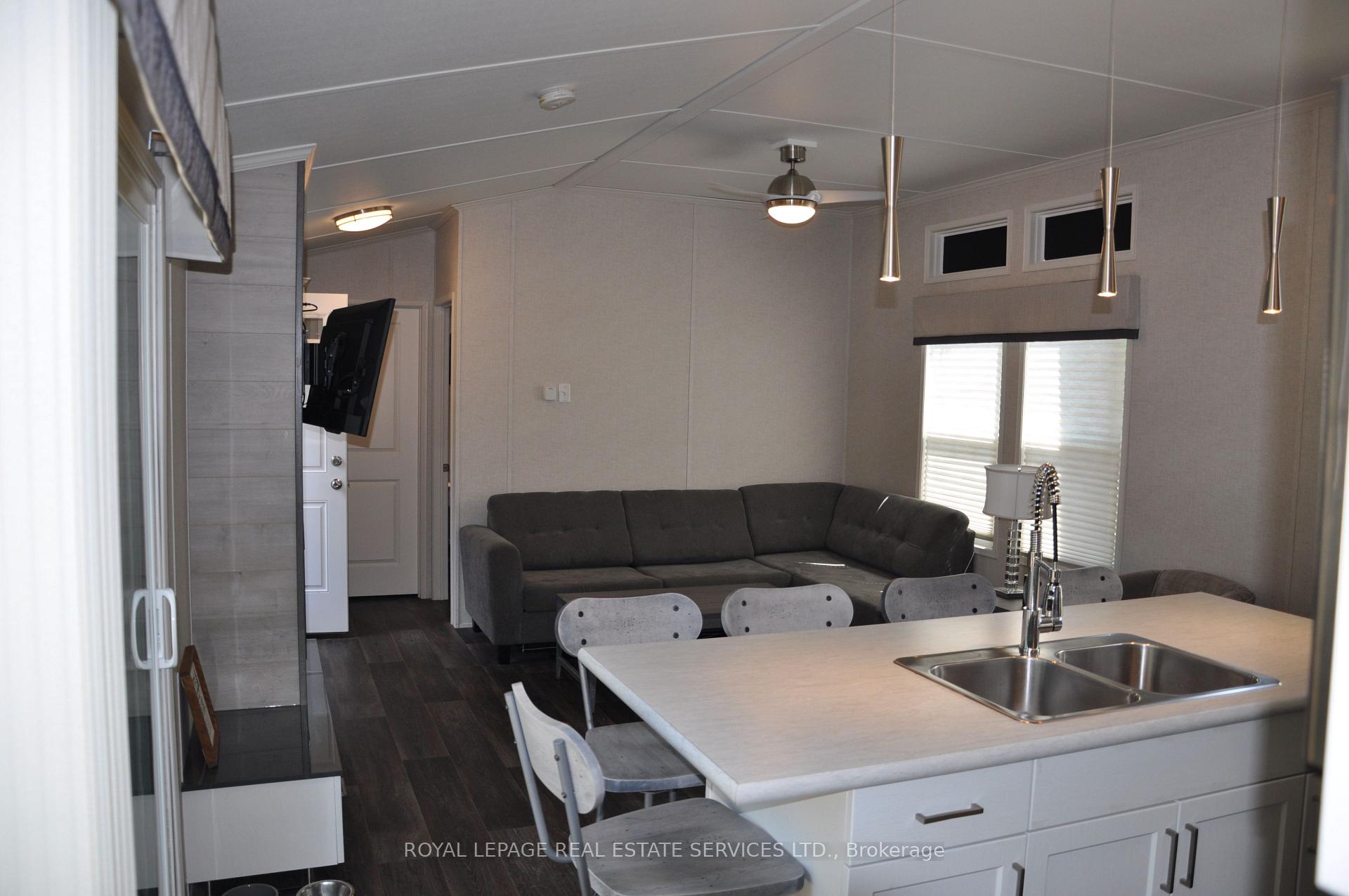 Photo 6 of 85 Theme Park Drive, Wasaga Beach — HOMEH