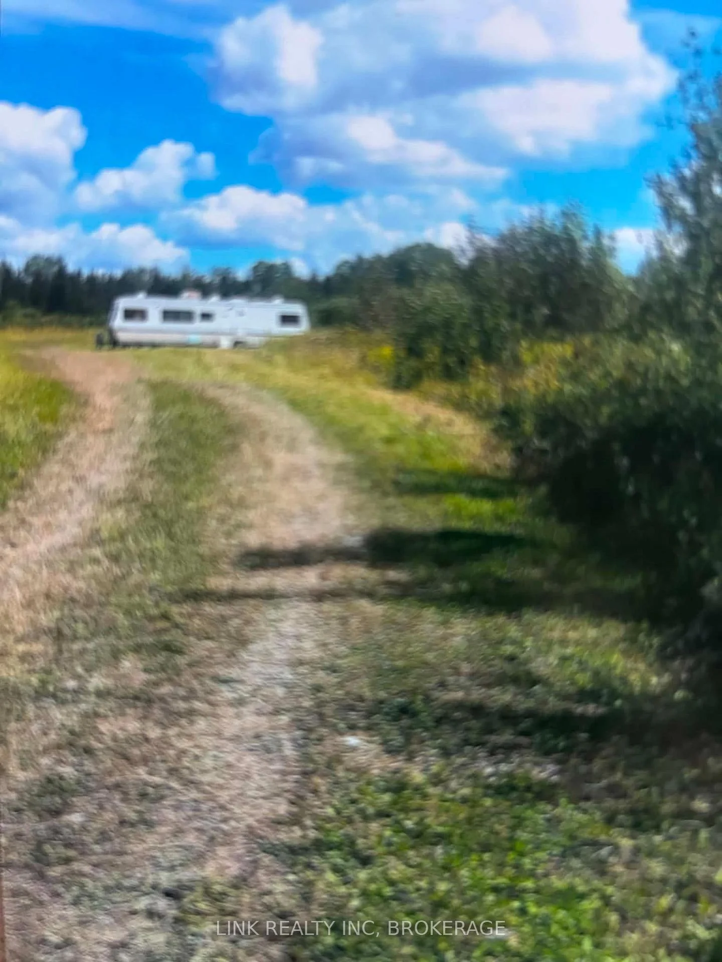 Photo 1 of 909 Silver Queen Lake Road E, Cochrane — HOMEH