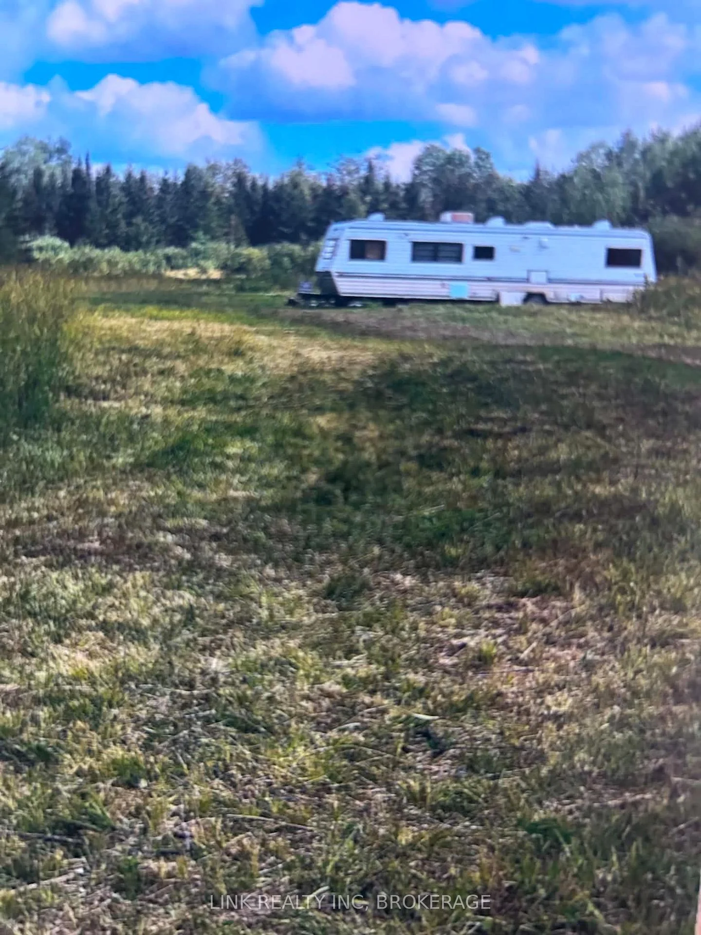 Photo 6 of 909 Silver Queen Lake Road E, Cochrane — HOMEH
