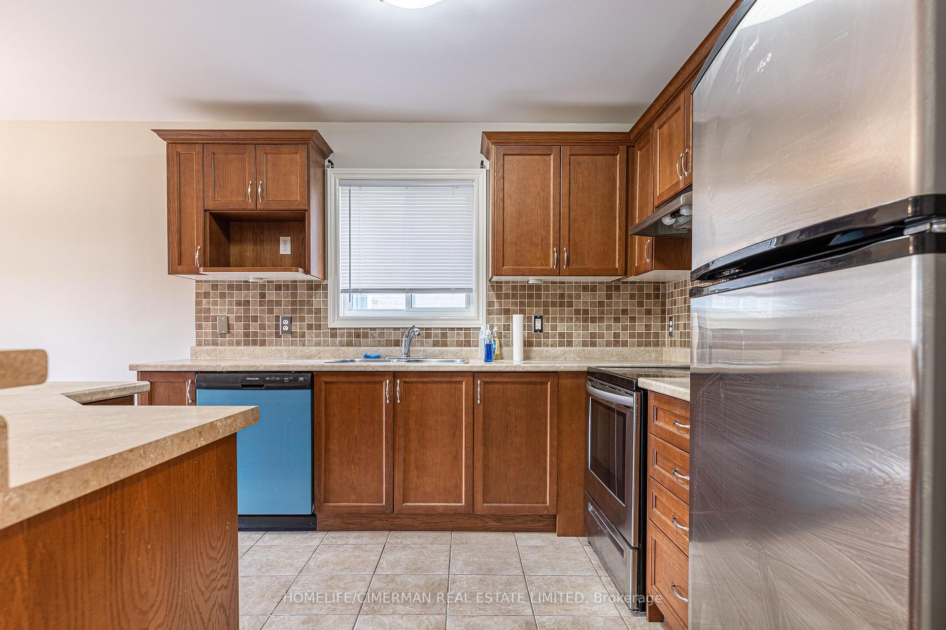 Photo 3 of 1202 Smither Road, London, North I — HOMEH