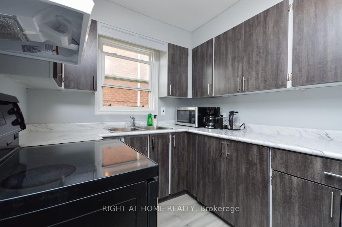 Photo 2 of 9 Donald Avenue, Toronto, Keelesdale-Eglinton West — HOMEH