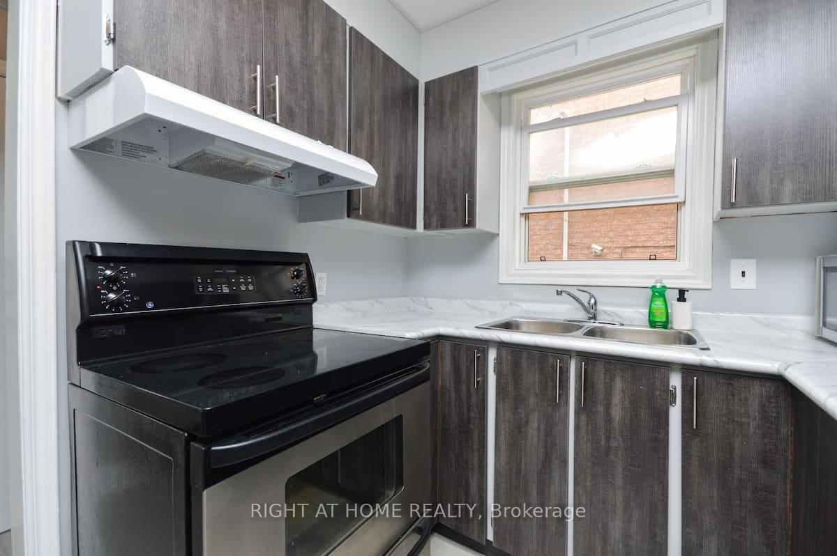 Photo 3 of 9 Donald Avenue, Toronto, Keelesdale-Eglinton West — HOMEH