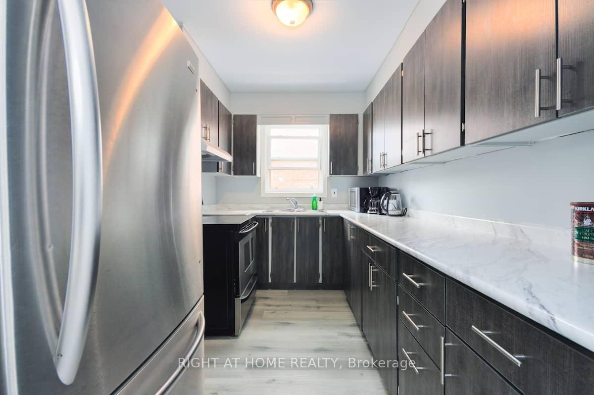 Photo 4 of 9 Donald Avenue, Toronto, Keelesdale-Eglinton West — HOMEH