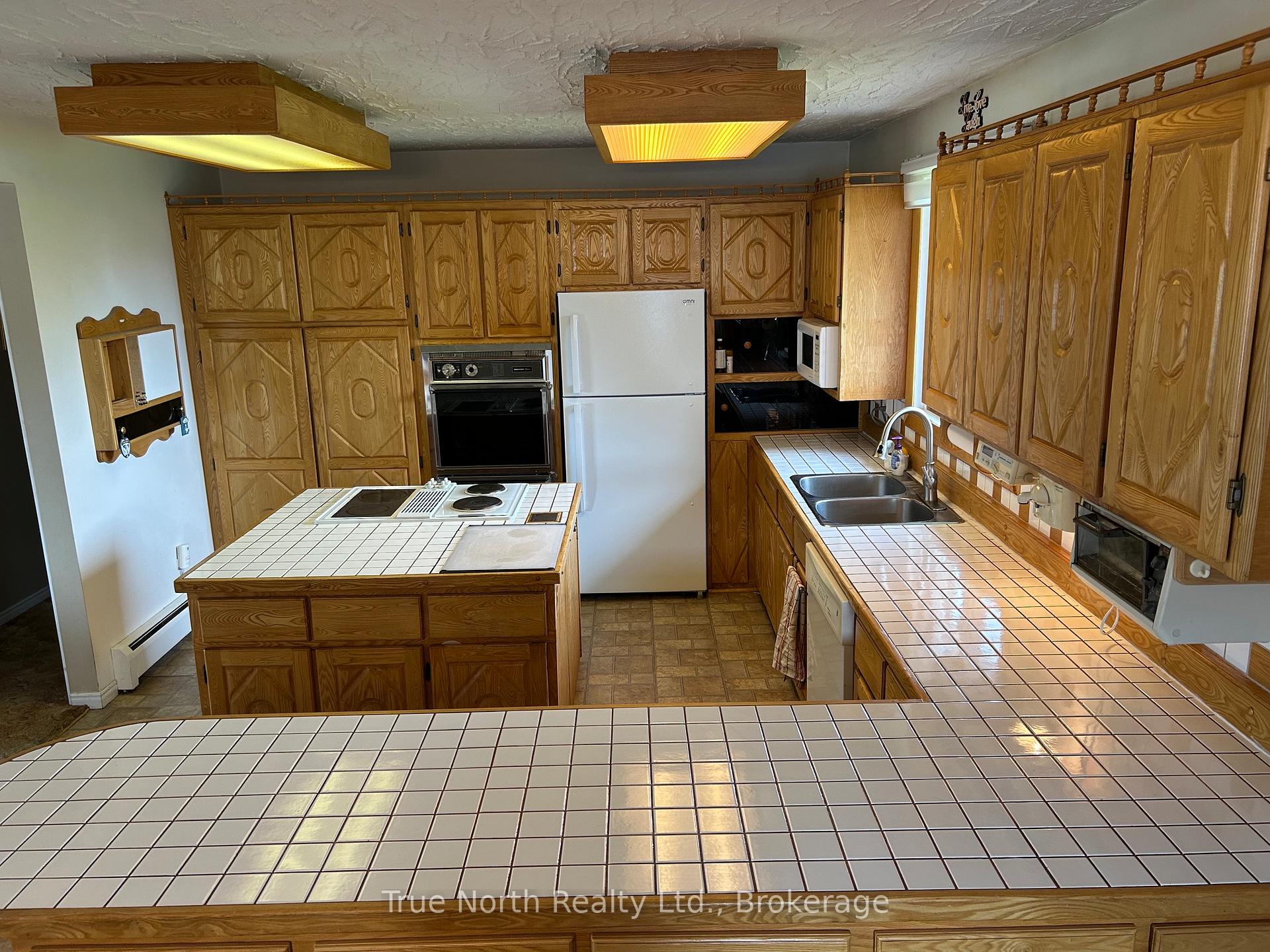 Photo 3 of 16 Brock Crescent, Kapuskasing — HOMEH
