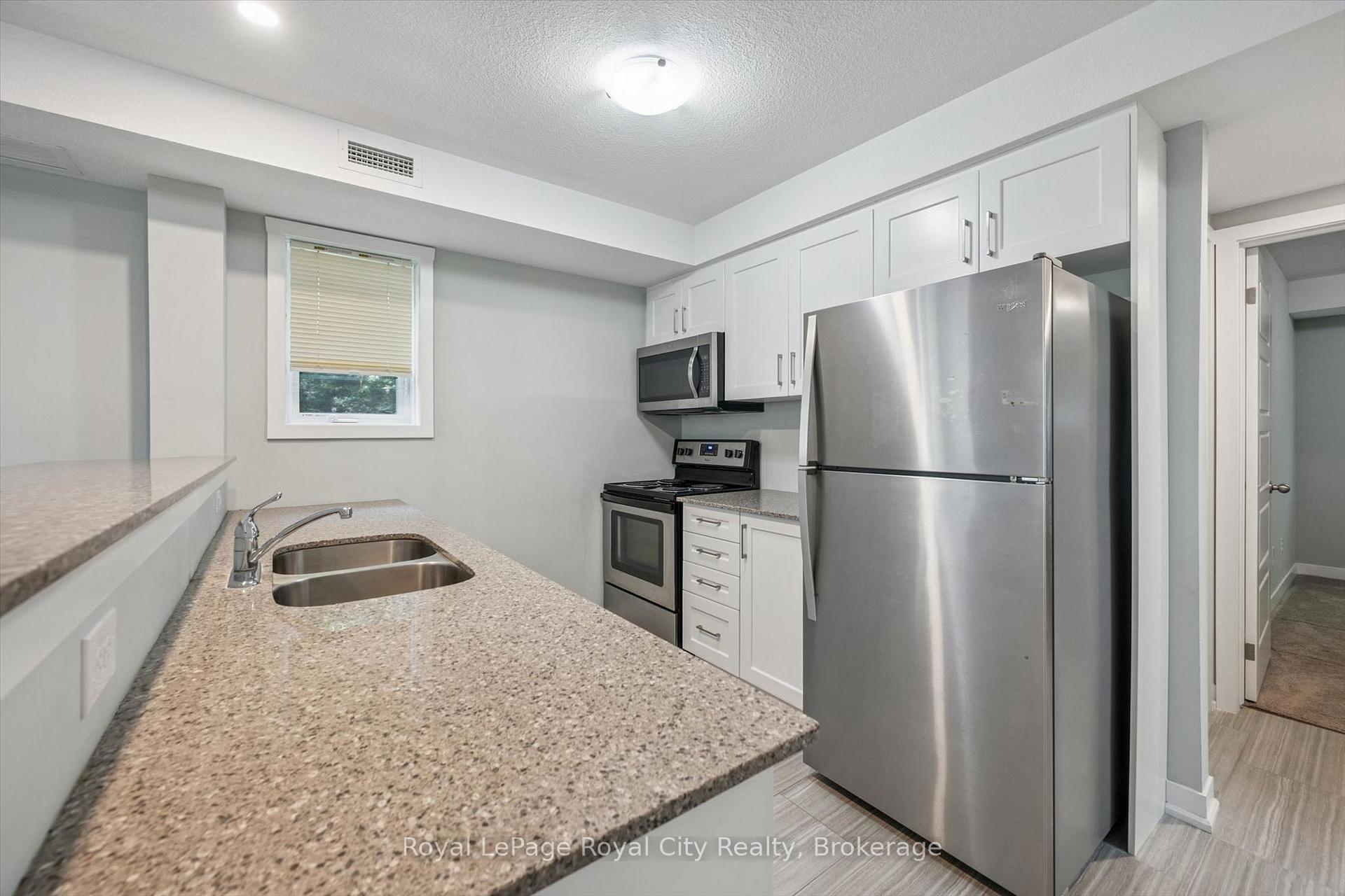 Photo 8 of Unit C1, 190 Century Hill Drive, Kitchener, Country Hills — HOMEH