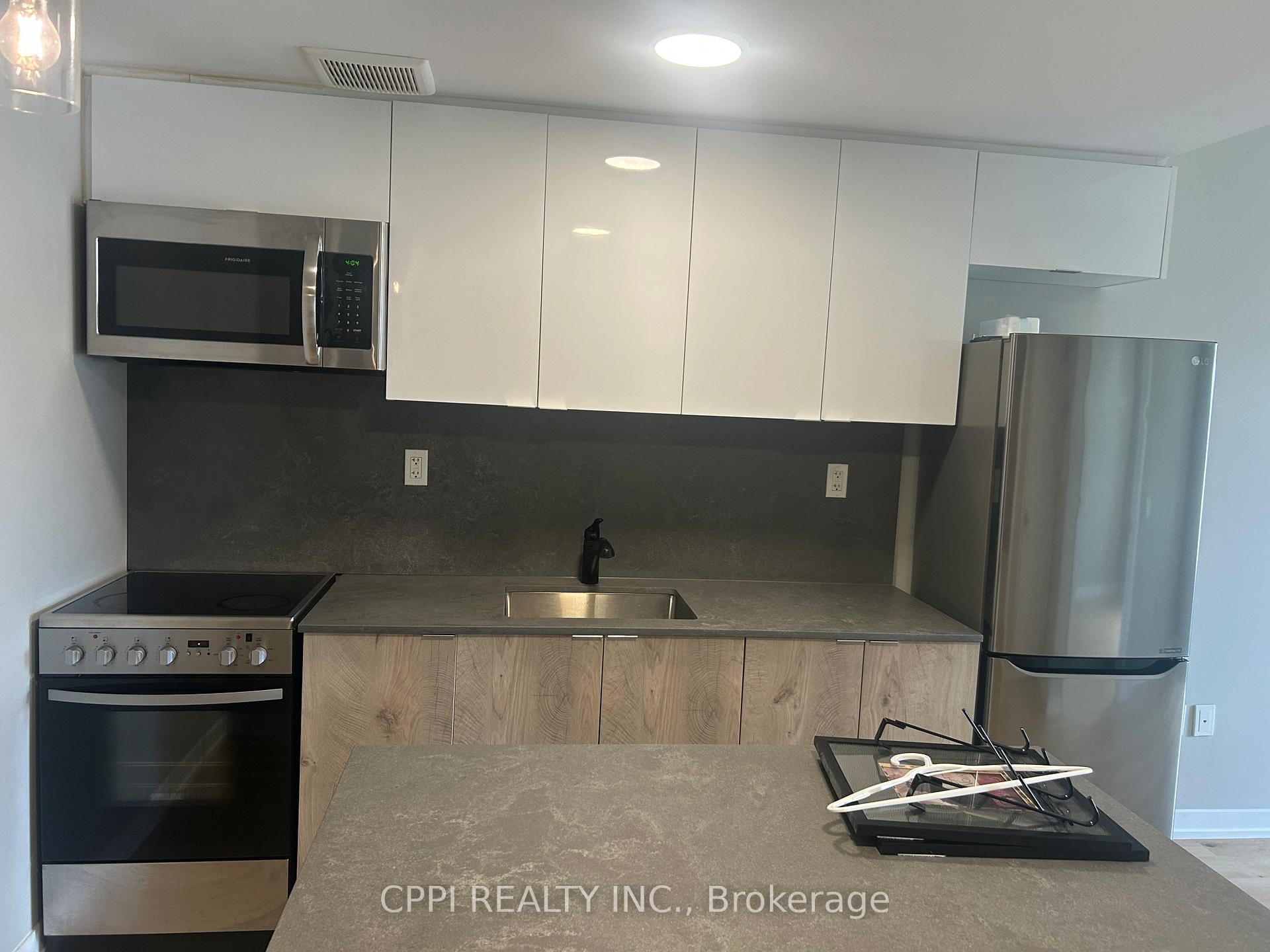 Photo 4 of Unit 303, 70 King Street E, Oshawa, Central — HOMEH