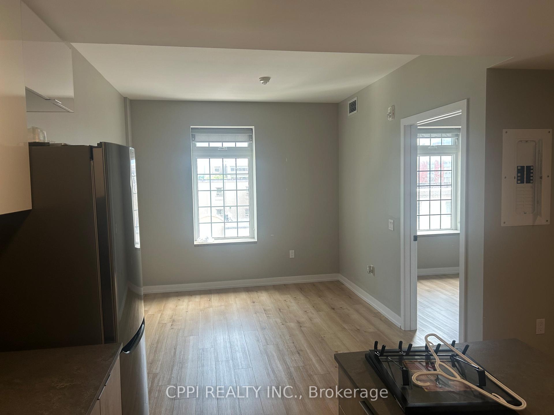 Photo 5 of Unit 303, 70 King Street E, Oshawa, Central — HOMEH