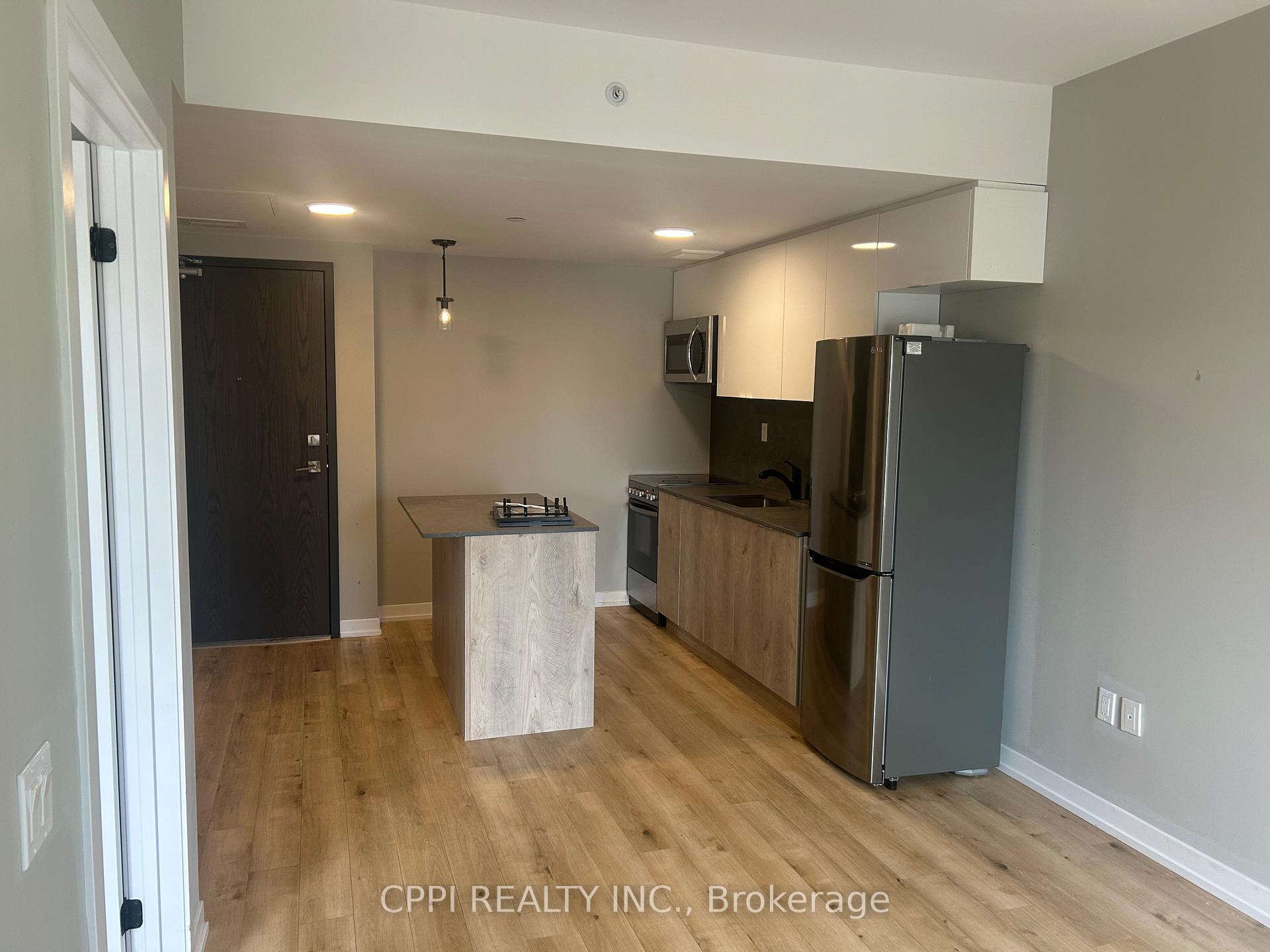 Photo 6 of Unit 303, 70 King Street E, Oshawa, Central — HOMEH