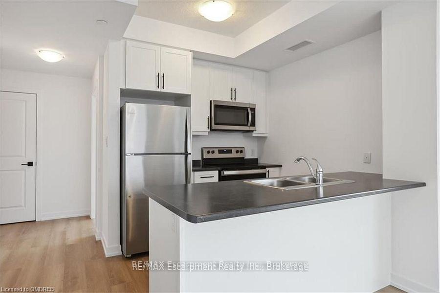 Photo 12 of Unit 423, 470 Dundas Street E, Hamilton, Waterdown — HOMEH