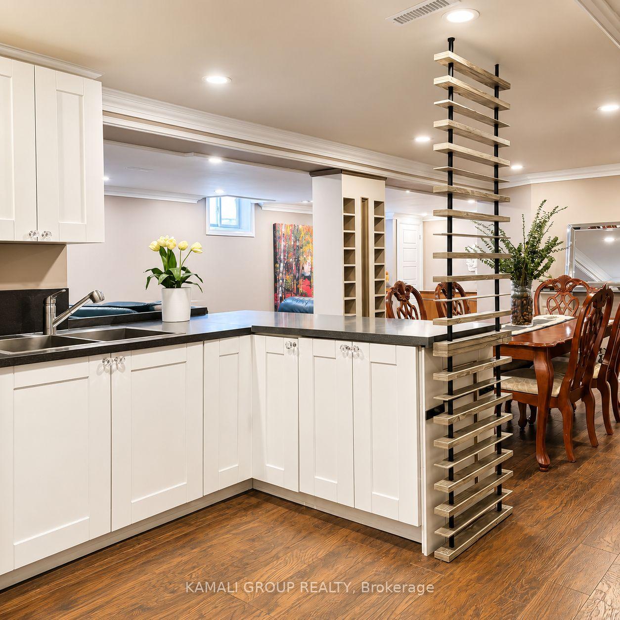 Photo 4 of Unit BSMT, 83 Tamarac Trail, Aurora, Aurora Highlands — HOMEH