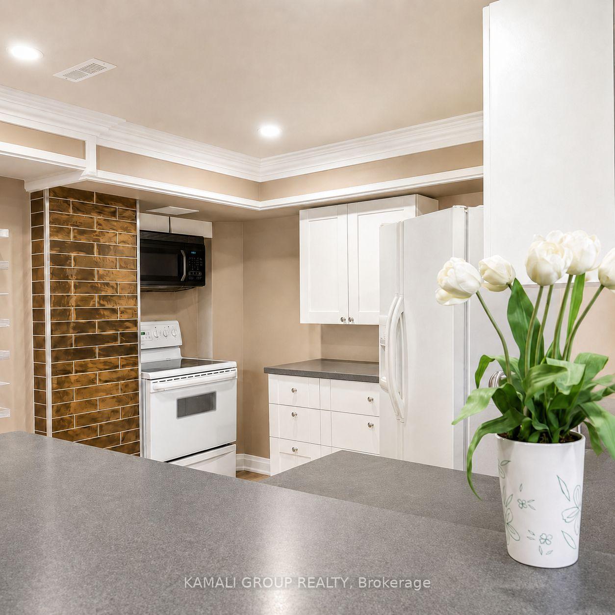 Photo 6 of Unit BSMT, 83 Tamarac Trail, Aurora, Aurora Highlands — HOMEH