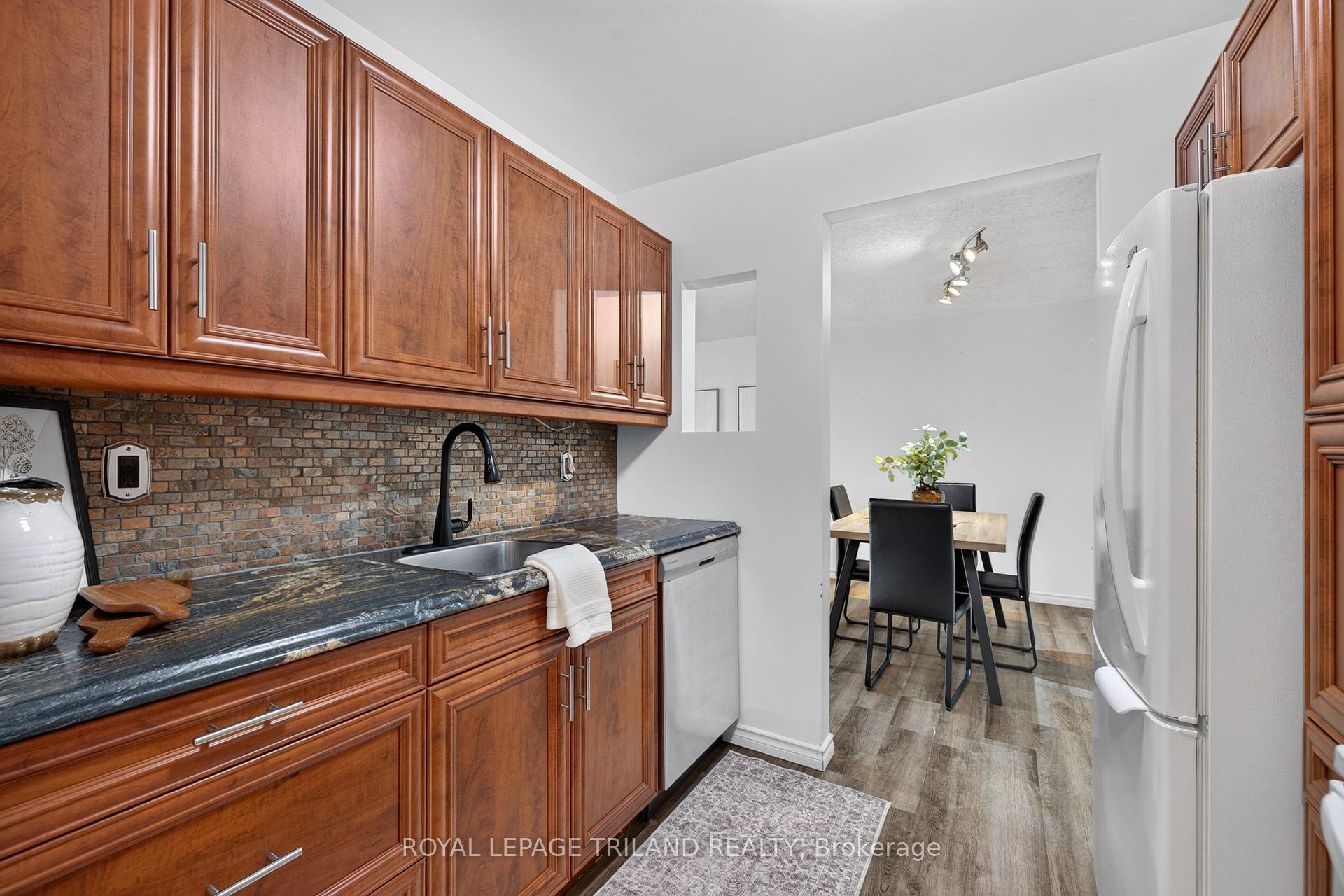 Photo 7 of Unit 102, 735 Deveron Crescent, London, South T — HOMEH