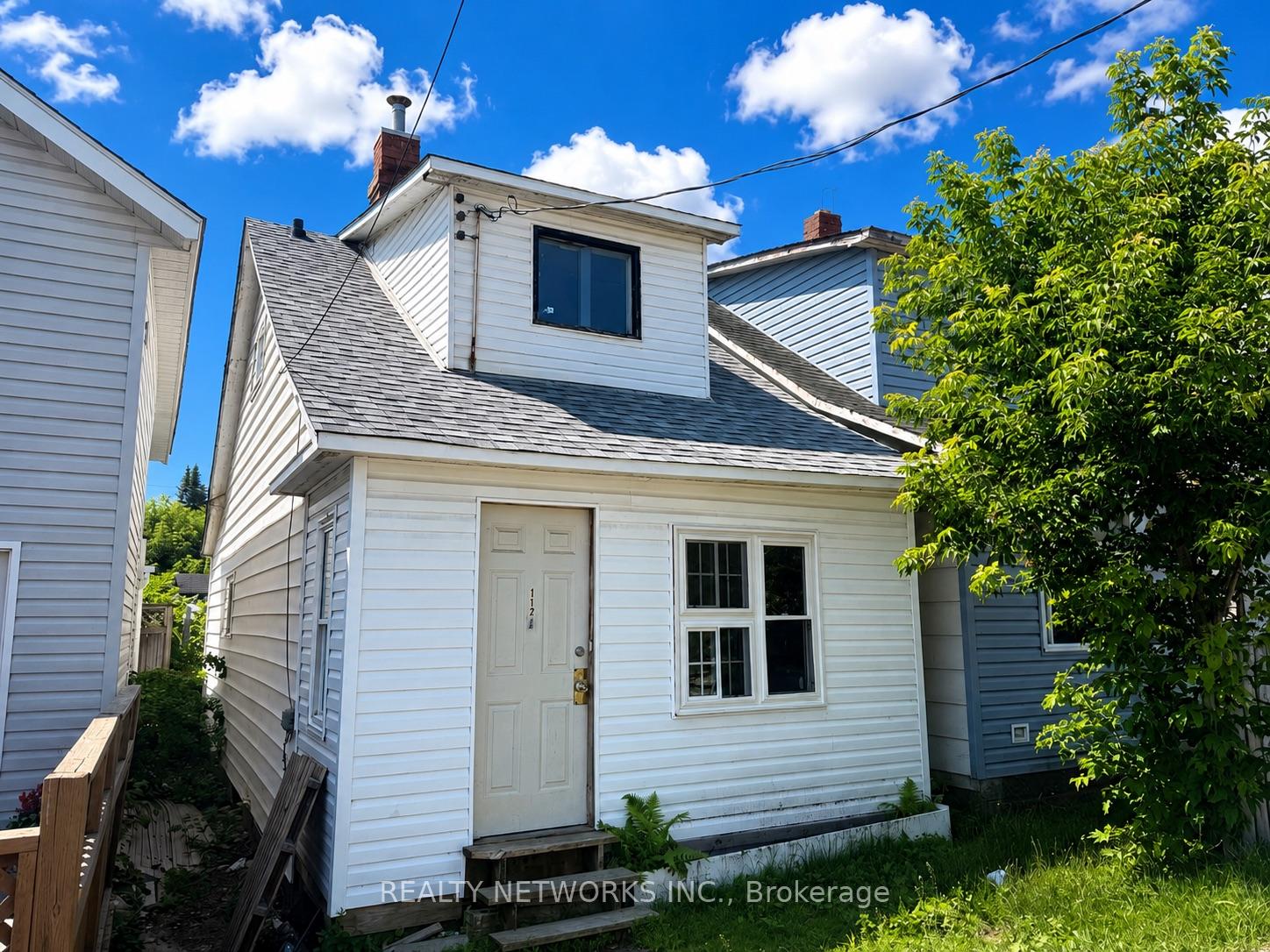 Front of 112 Father Costello Drive