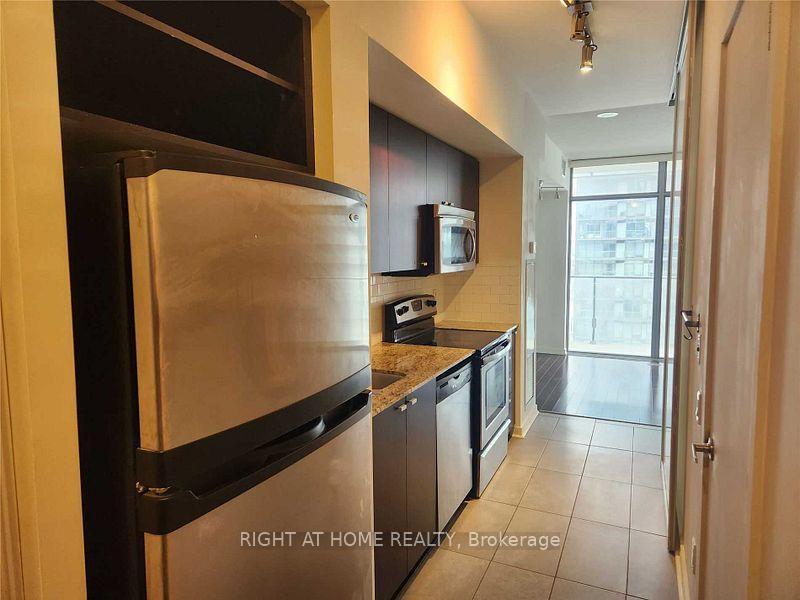 Photo 6 of Unit 1207, 103 The Queensway, Toronto, High Park-Swansea — HOMEH