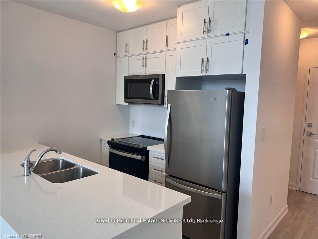 Photo 3 of Unit 513, 450 Dundas Street E, Hamilton, Waterdown — HOMEH