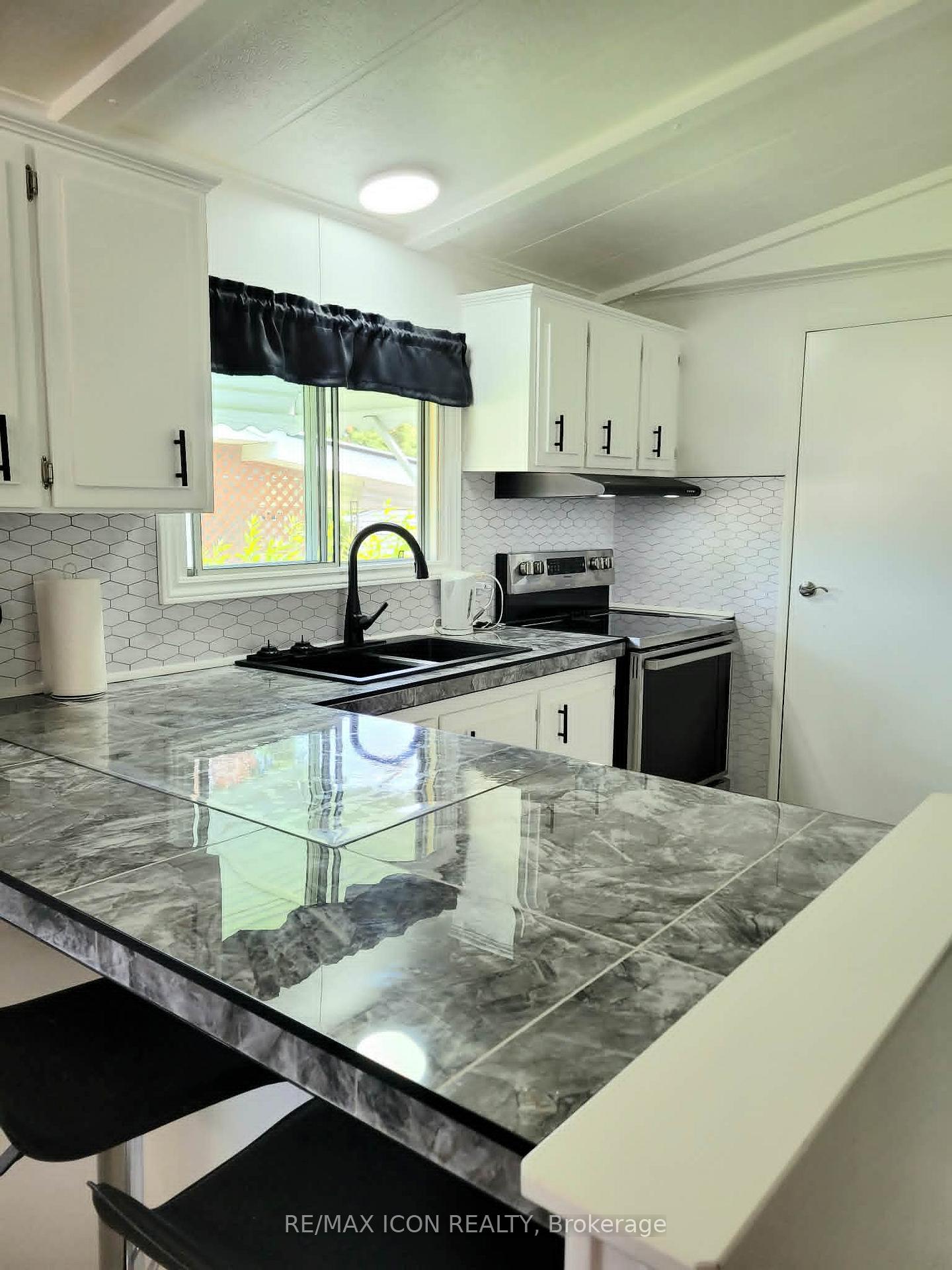 Photo 15 of Unit 105, 1940 London Line, Sarnia — HOMEH