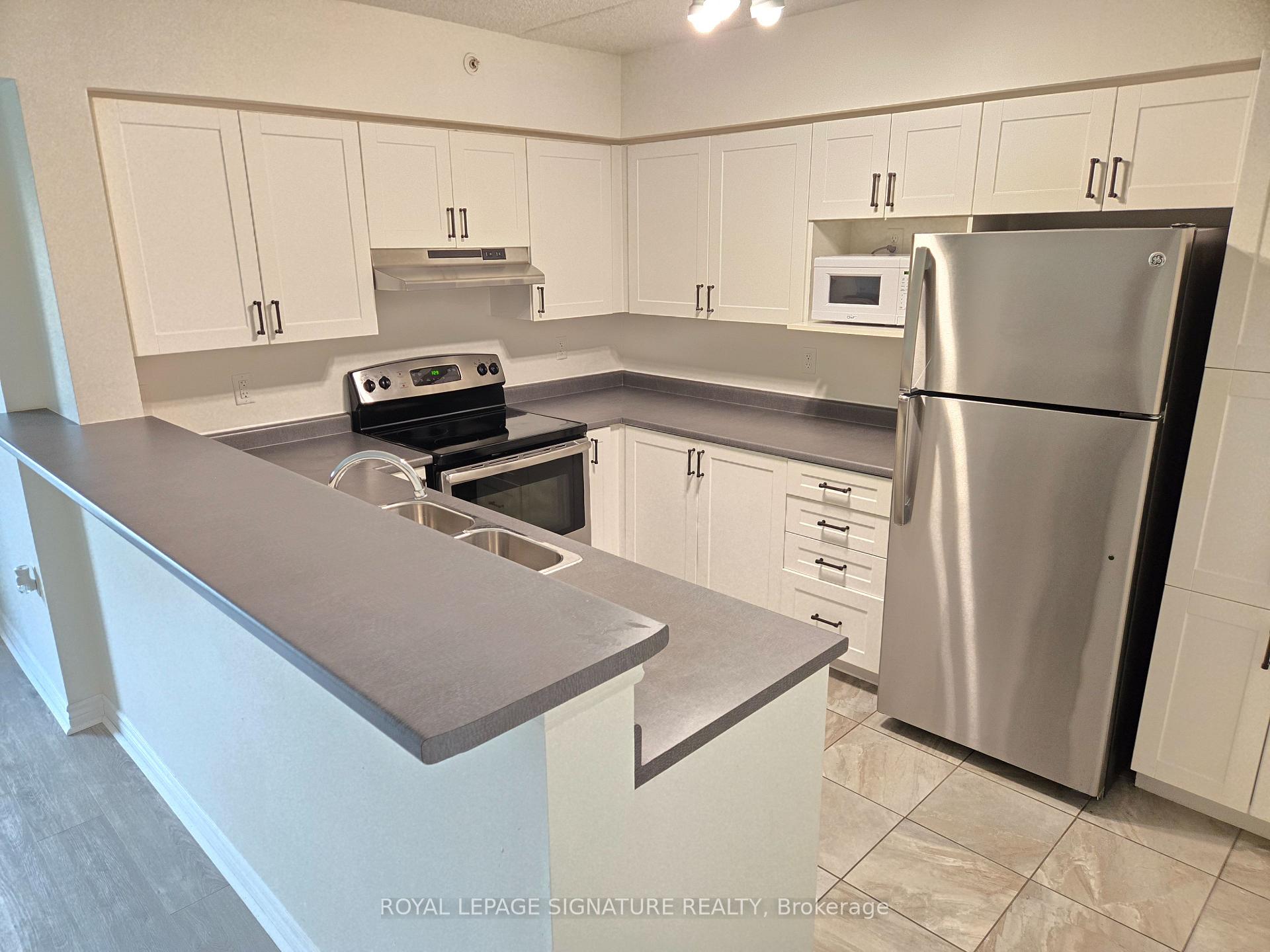 Photo 4 of Unit 210, 1460 Main Street, Milton, Dempsey — HOMEH