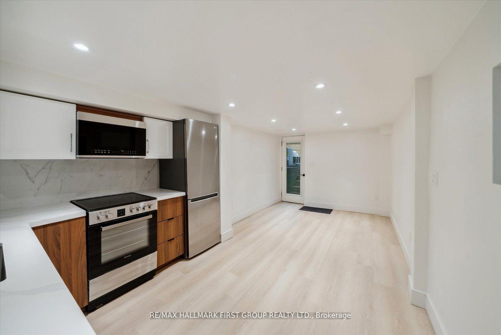 Photo 5 of Unit Lower, 285 Rhodes Avenue, Toronto, Greenwood-Coxwell — HOMEH