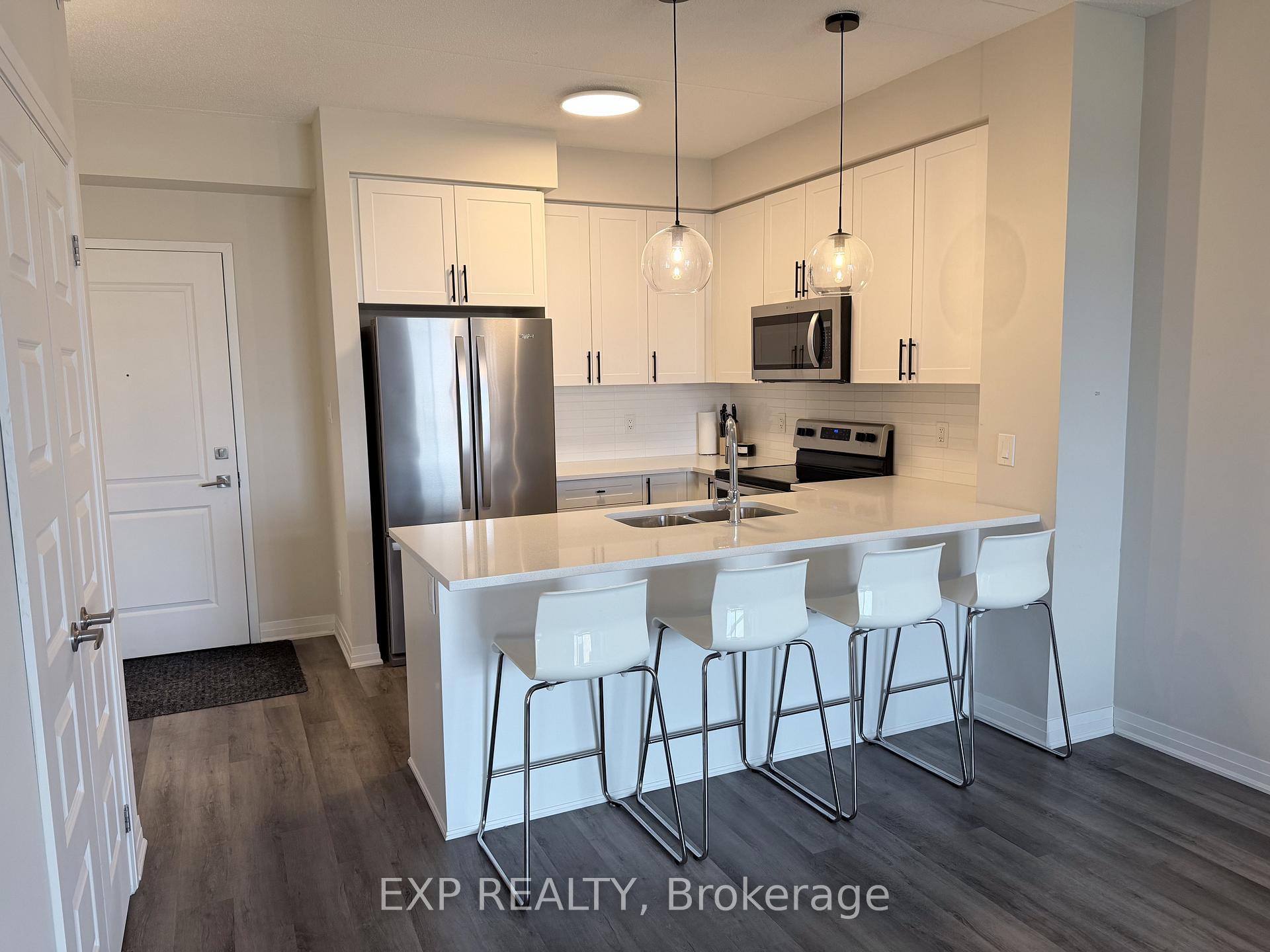 Photo 3 of Unit 513, 610 Farmstead Drive, Milton, Willmott — HOMEH
