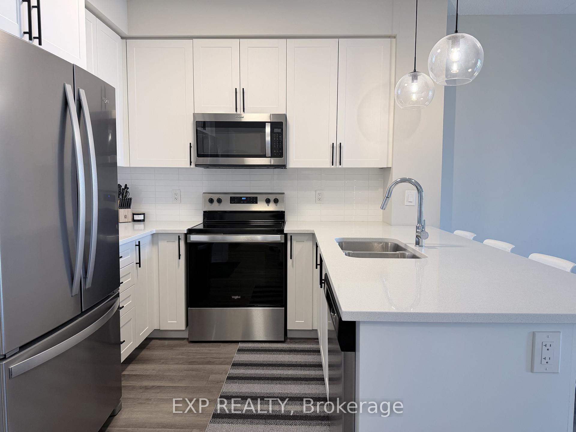 Photo 4 of Unit 513, 610 Farmstead Drive, Milton, Willmott — HOMEH