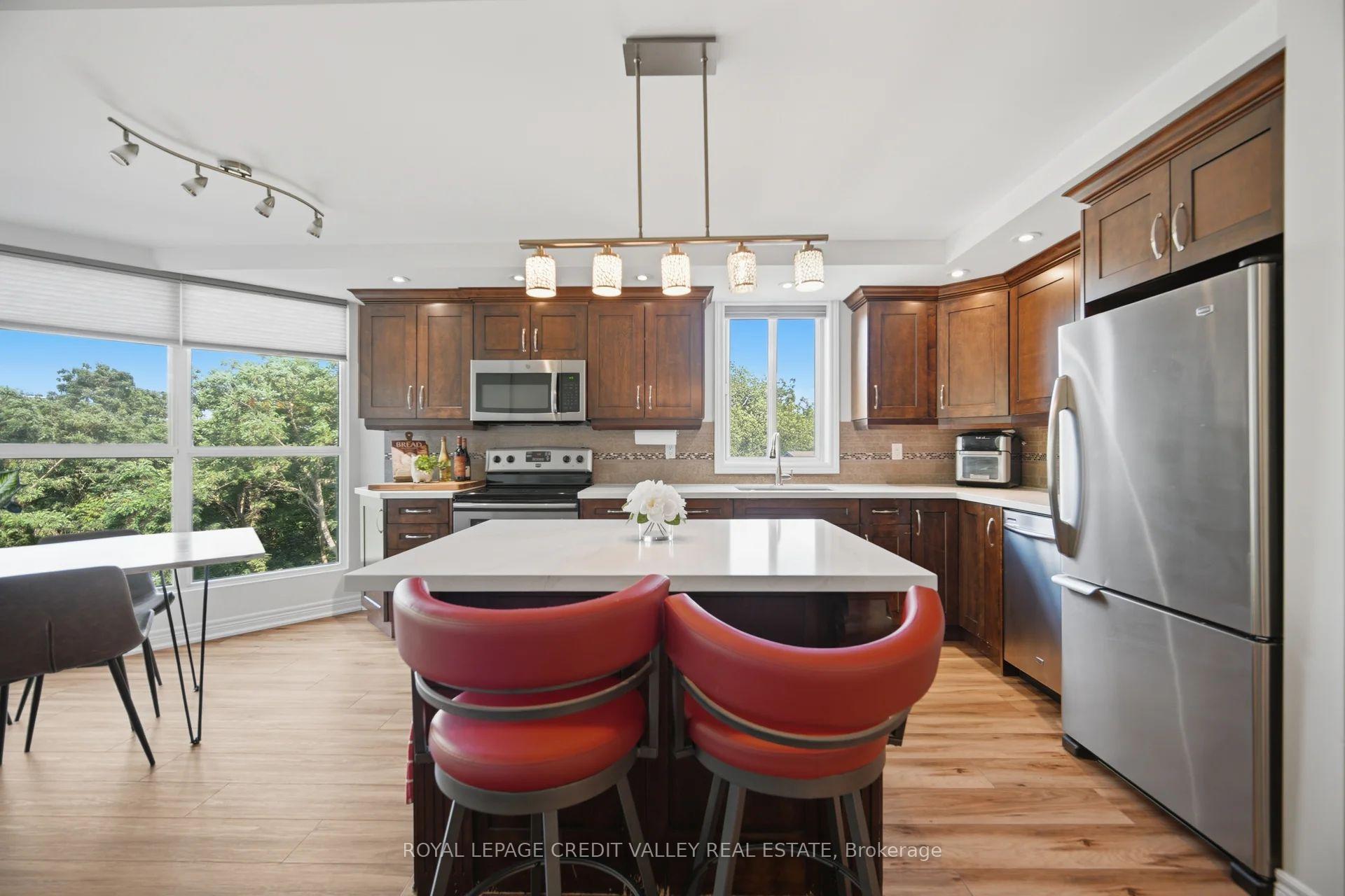 Photo 17 of Unit 407, 8351 Mclaughlin Road S, Brampton, Brampton South — HOMEH