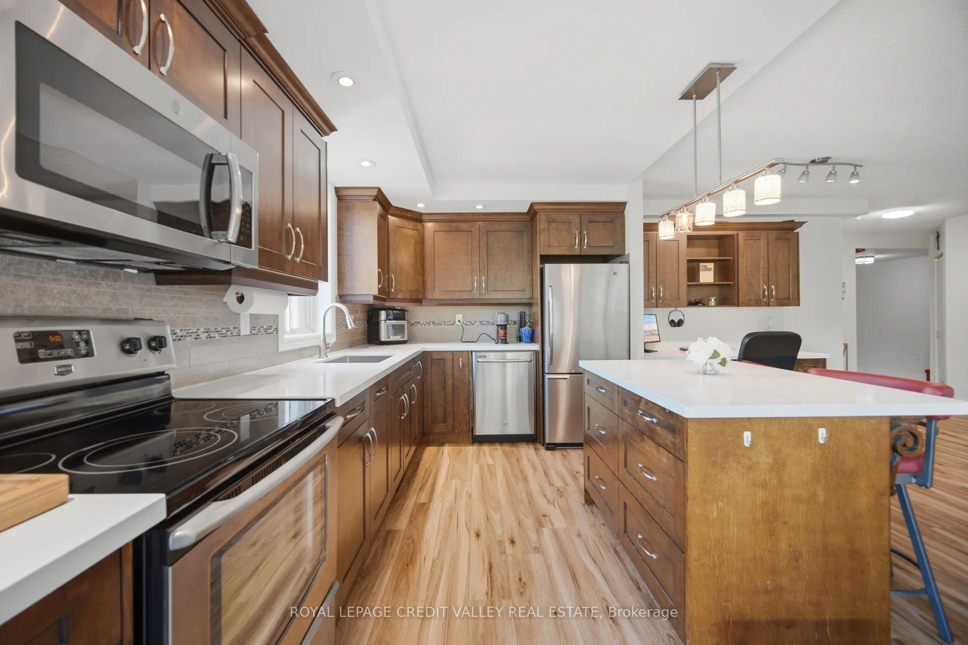 Photo 20 of Unit 407, 8351 Mclaughlin Road S, Brampton, Brampton South — HOMEH