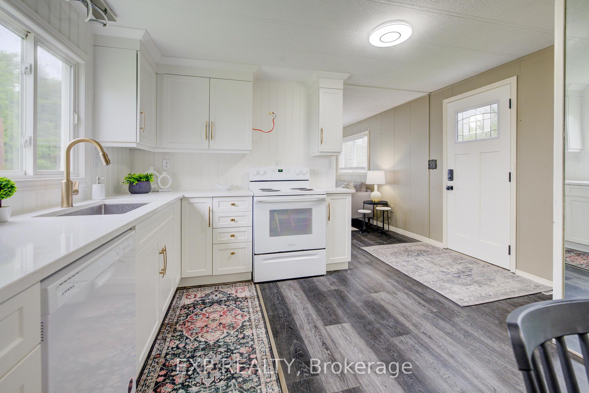 Photo 12 of Unit 7, 84 Wellington Street S, Mapleton, Rural Mapleton — HOMEH