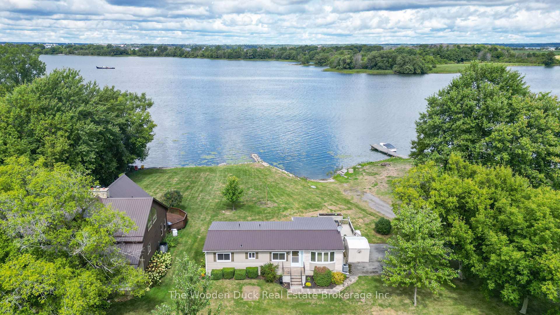 Photo 1 of 1314 County RD 96, Frontenac Islands, Wolfe Island — HOMEH