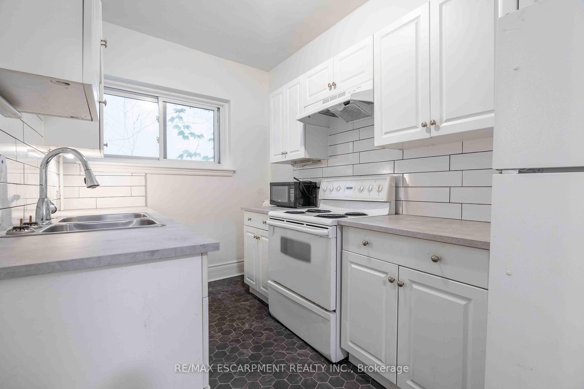 Photo 12 of Unit 4, 285 King Street W, Hamilton, Central — HOMEH