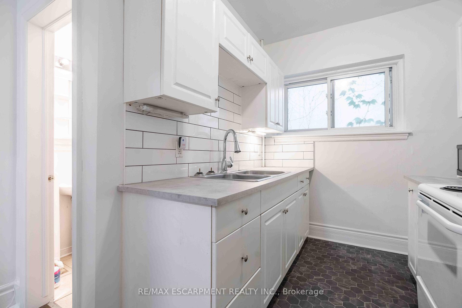 Photo 13 of Unit 4, 285 King Street W, Hamilton, Central — HOMEH