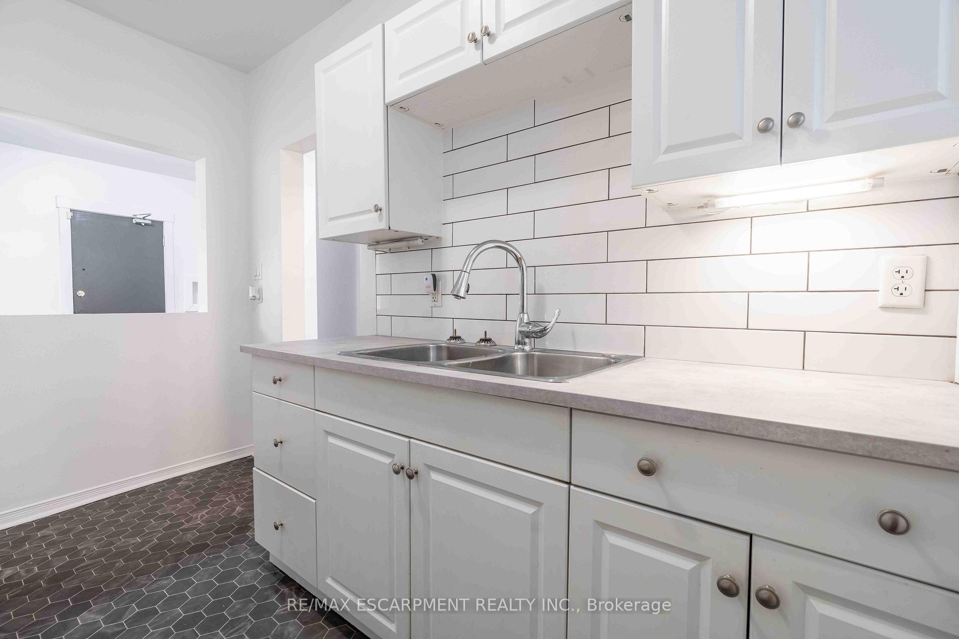 Photo 14 of Unit 4, 285 King Street W, Hamilton, Central — HOMEH