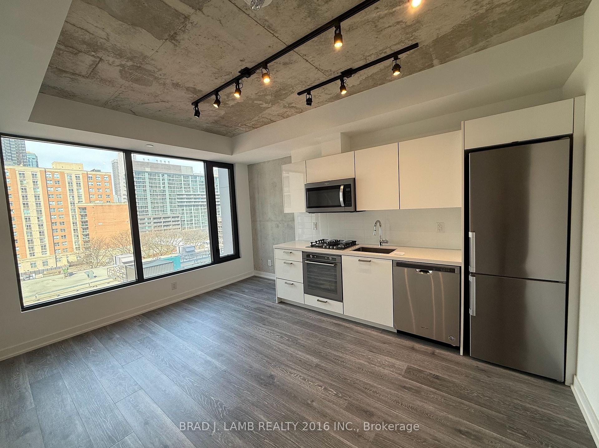 Photo 4 of Unit 717, 55 Ontario Street, Toronto, Moss Park — HOMEH