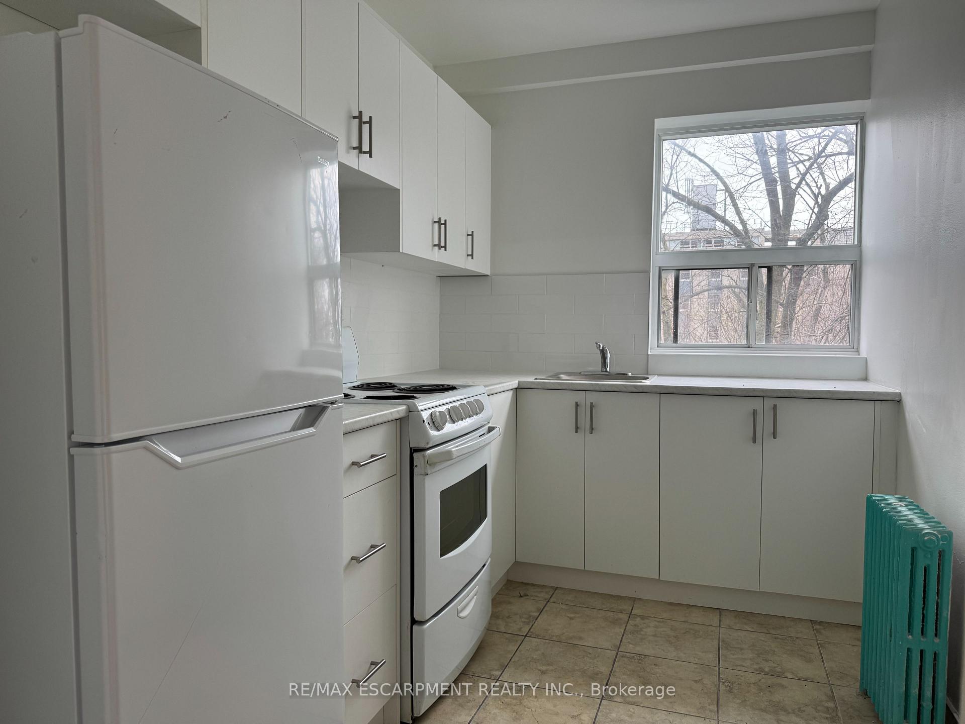 Photo 1 of Unit 106, 325A James Street S, Hamilton, Corktown — HOMEH