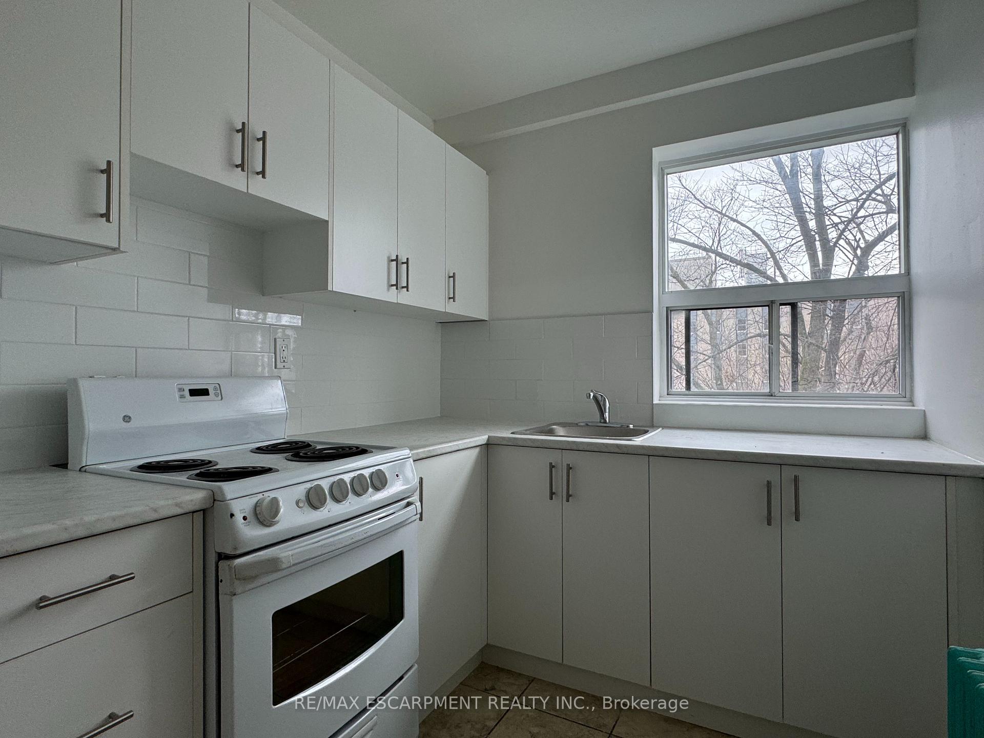 Photo 2 of Unit 106, 325A James Street S, Hamilton, Corktown — HOMEH