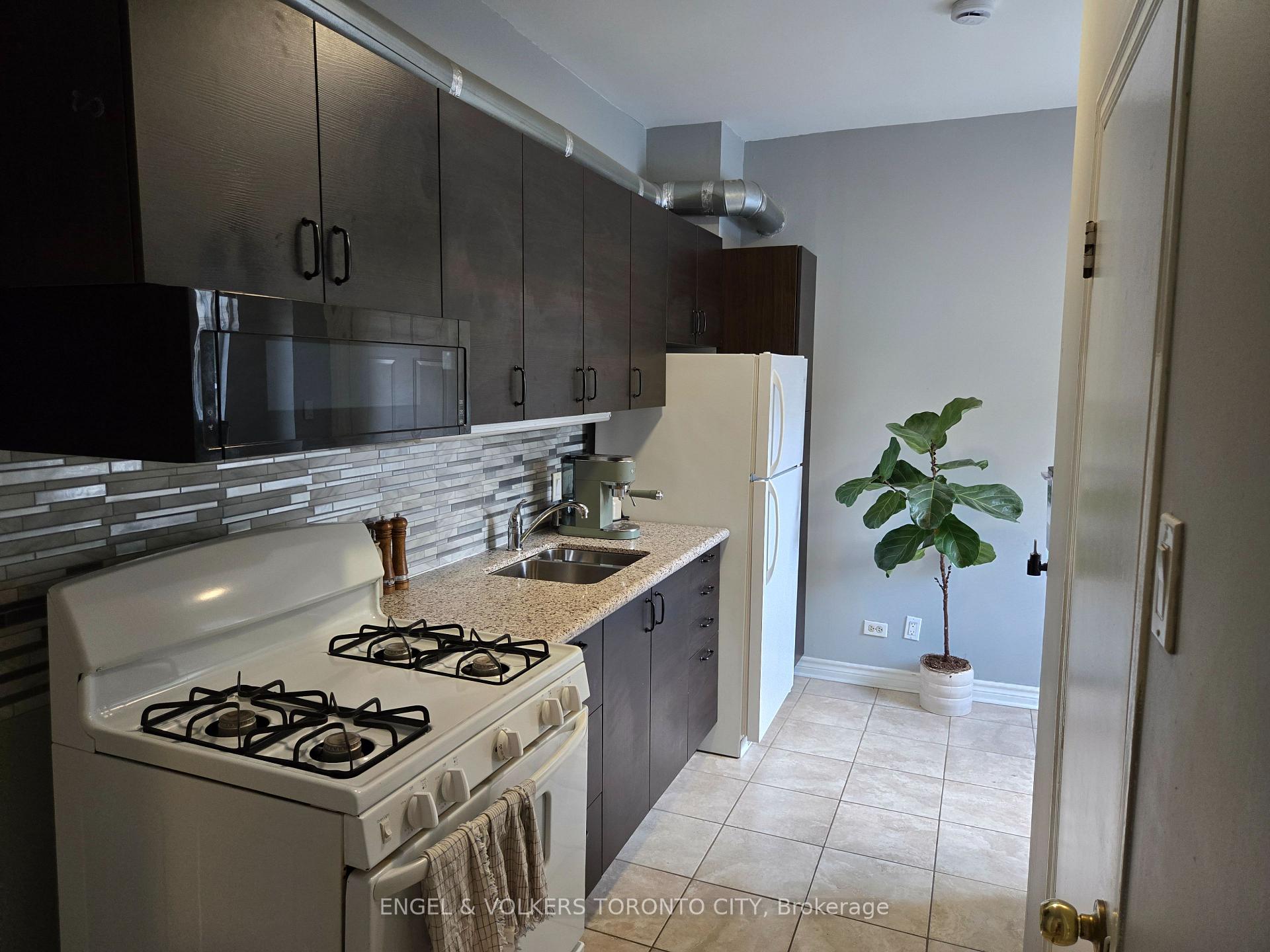 Photo 4 of Unit Main, 132 De Grassi Street, Toronto, South Riverdale — HOMEH