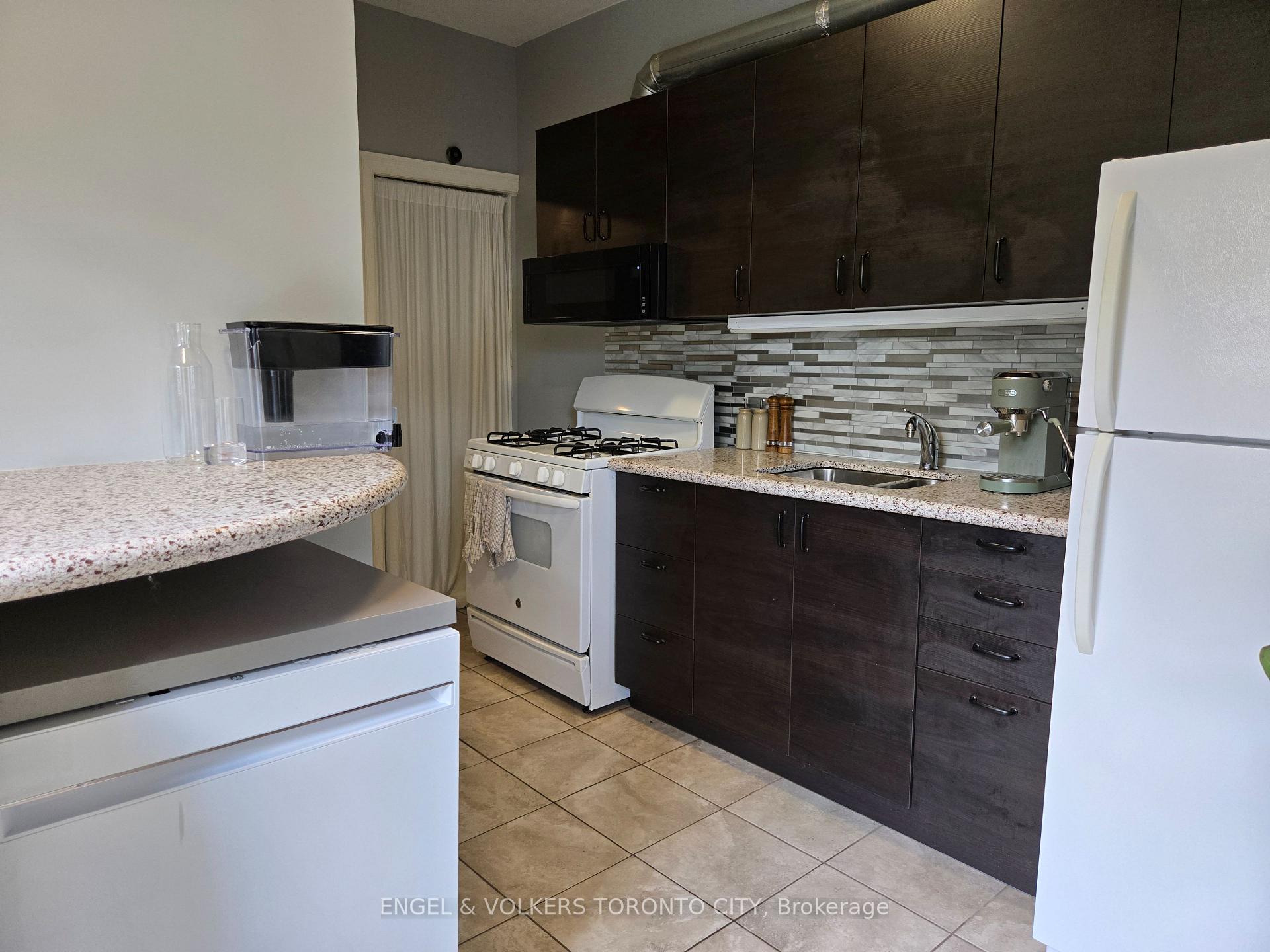 Photo 6 of Unit Main, 132 De Grassi Street, Toronto, South Riverdale — HOMEH
