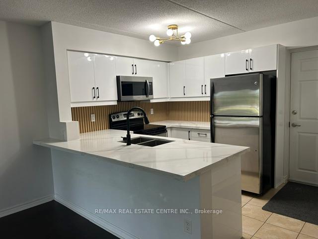 Photo 3 of Unit 103, 1370 Main Street E, Milton, Dempsey — HOMEH