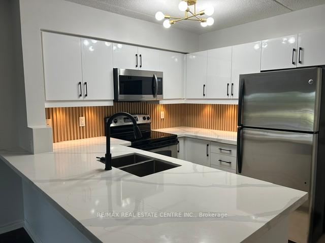 Photo 5 of Unit 103, 1370 Main Street E, Milton, Dempsey — HOMEH