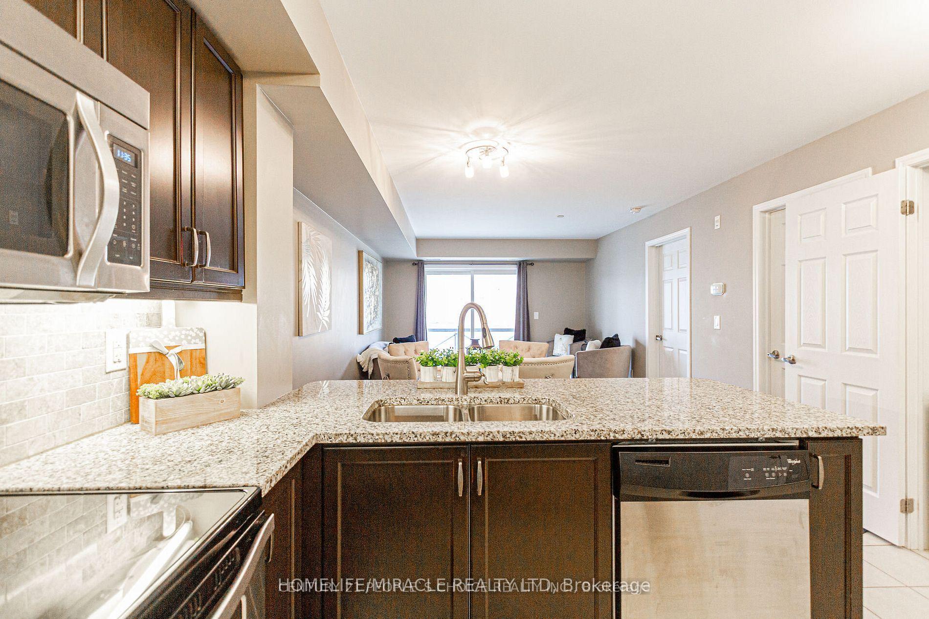 Photo 11 of Unit 211, 1045 Nadalin Heights, Milton, Willmott — HOMEH
