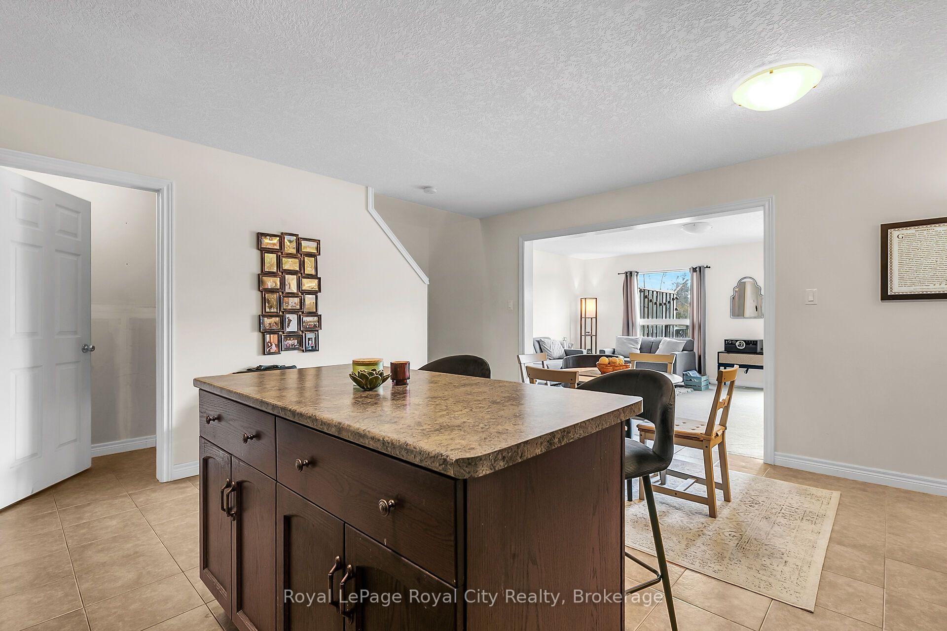 Photo 13 of Unit 9, 355 Macalister Boulevard, Guelph, Kortright East — HOMEH