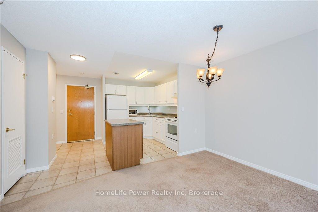Photo 2 of Unit 307, 685 Woolwich Street, Guelph, Riverside Park — HOMEH