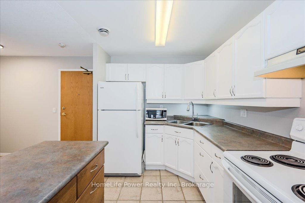 Photo 4 of Unit 307, 685 Woolwich Street, Guelph, Riverside Park — HOMEH
