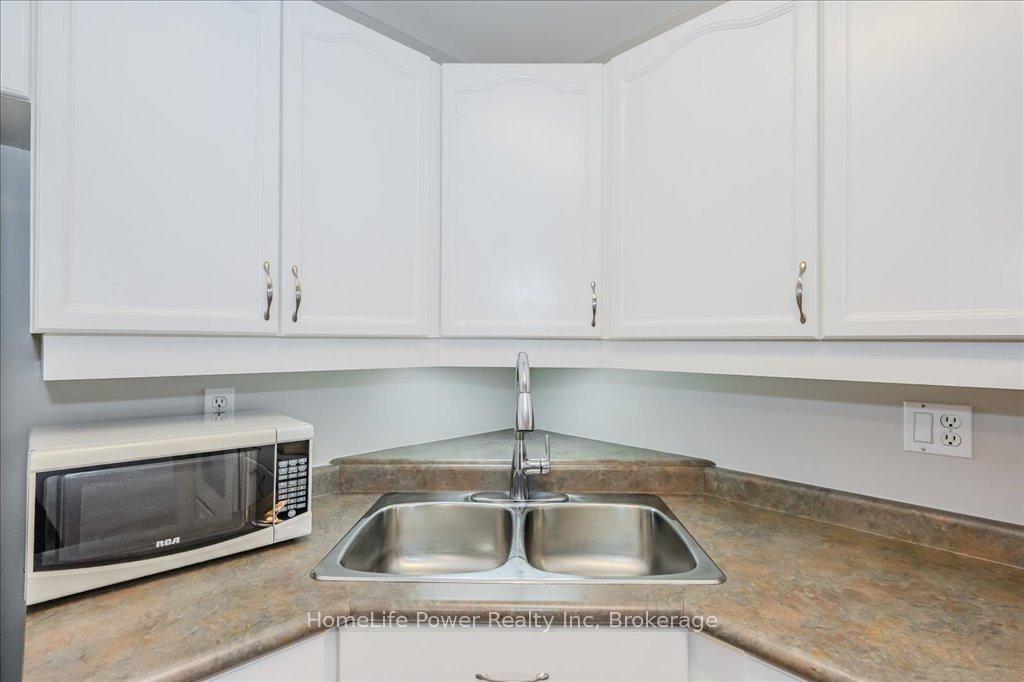 Photo 6 of Unit 307, 685 Woolwich Street, Guelph, Riverside Park — HOMEH