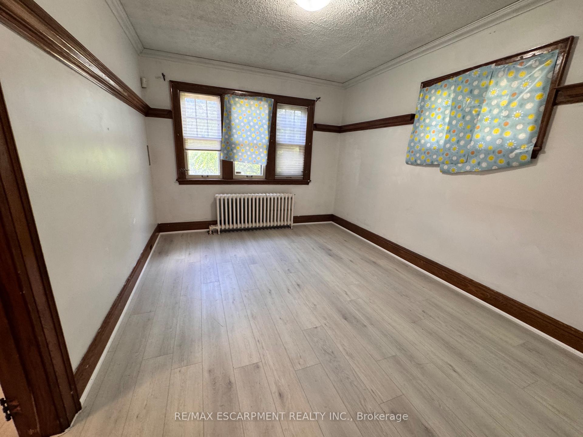 Photo 4 of 62 Plains Road E, Burlington, LaSalle — HOMEH