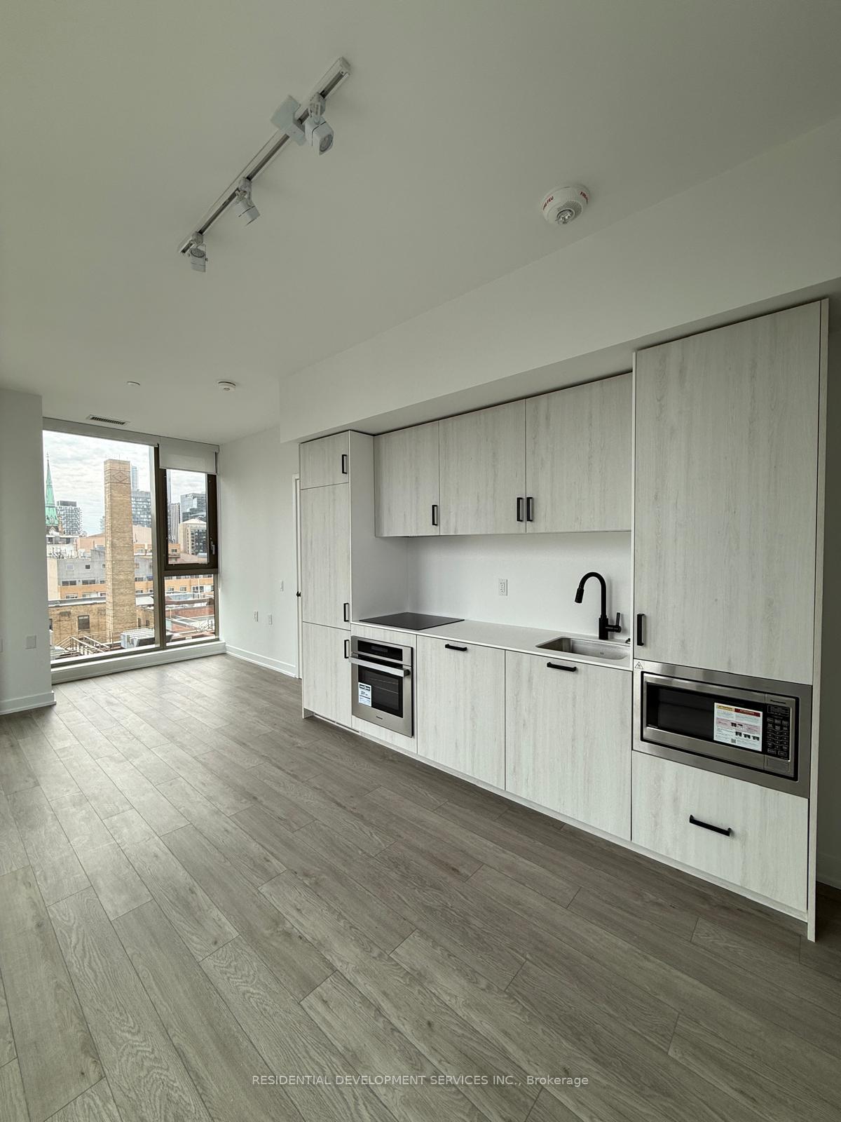 Photo 2 of Unit 703, 88 Queen Street, Toronto, Church-Yonge Corridor — HOMEH